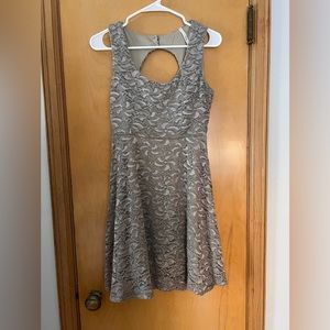 Gorgeous lacy taupe dress. Keyhole/open back